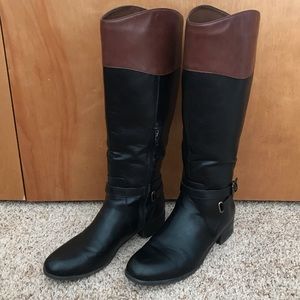 Brown and black riding boots